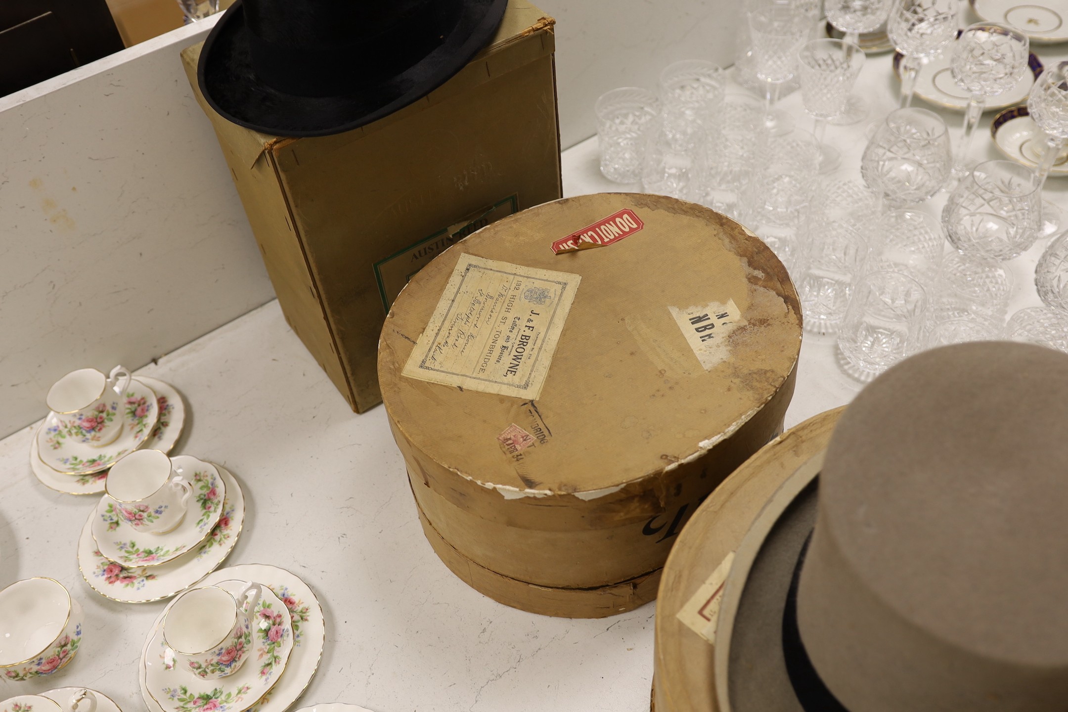 Three boxed top hats